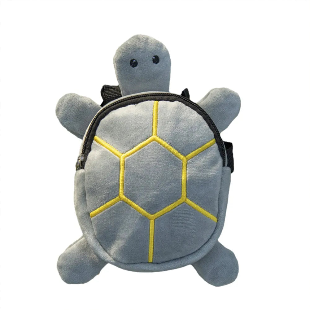 Turtle-shaped dog backpack harness in velvet with metal zipper, shown in available colours