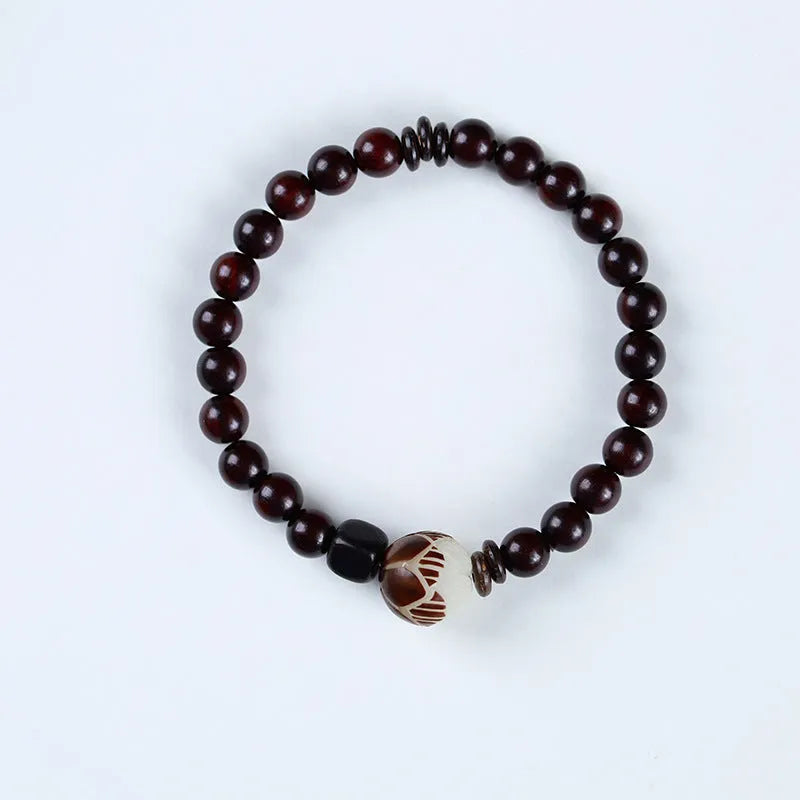 Natural rosewood double-ring bracelet with floral shape measuring 10mm wide, hand-knitted construction