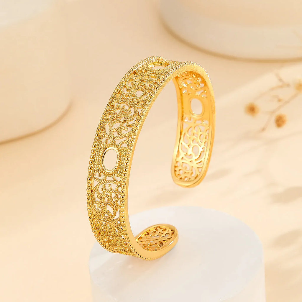 Gold bracelet with hollowed out lace flower design, gold finish, gold plated copper