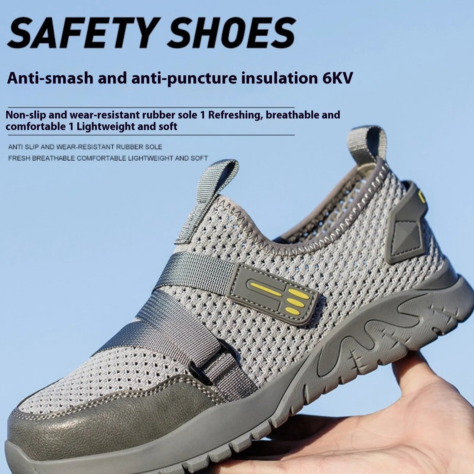 Men's grey safety work shoes with a woven upper and thick rubber sole on a work site background.