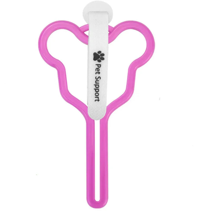 Hands-free dog poop bag holder with black velcro strap and clip attached to a dog leash.