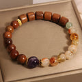 Women's pineapple yellow tower crystal bracelet with ebony amethyst stones, pearls and rhinestones