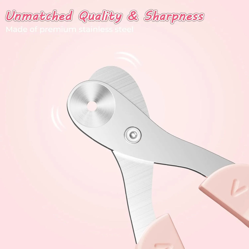 Close-up of a pink pet nail clipper showing the round positioning hole and stainless steel blade.