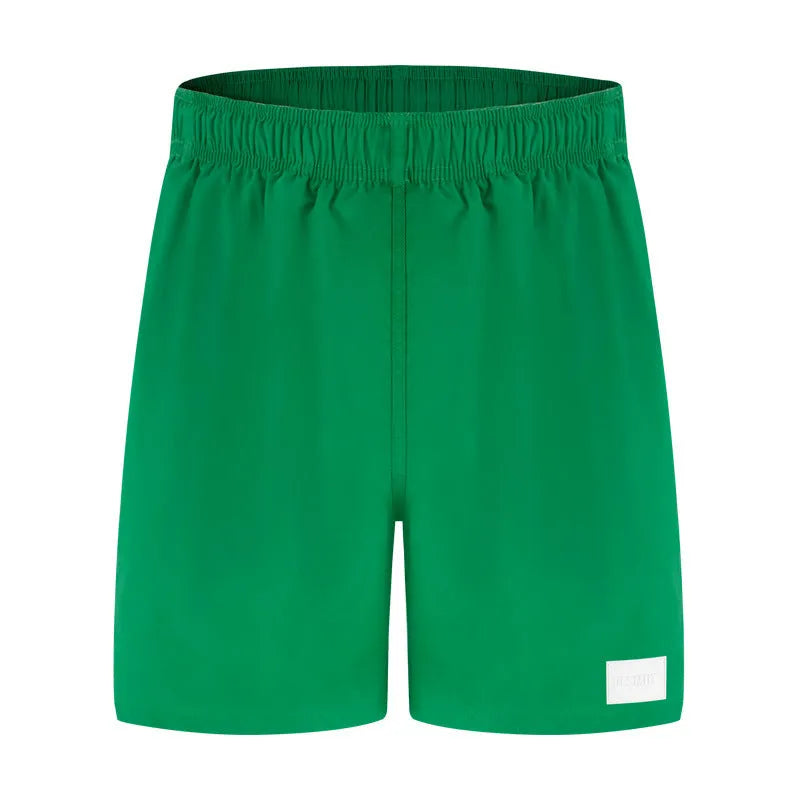 Men's quick-drying nylon sports shorts in blue with straight leg opening for beach and gym wear