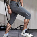 Men's cropped ice silk sports casual pants in black, blue, gray, or khaki colours