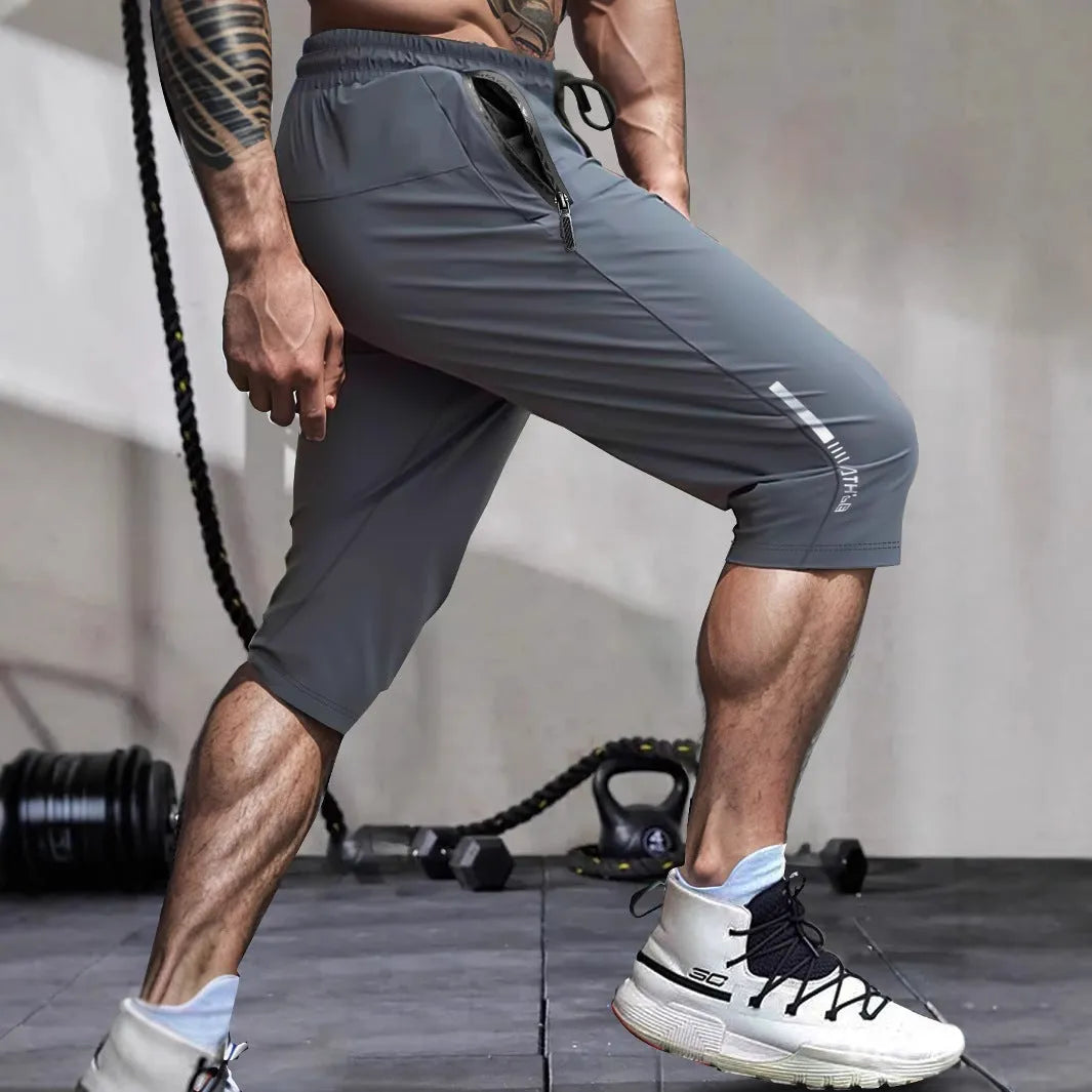 Men's cropped ice silk sports casual pants in black, blue, gray, or khaki colours