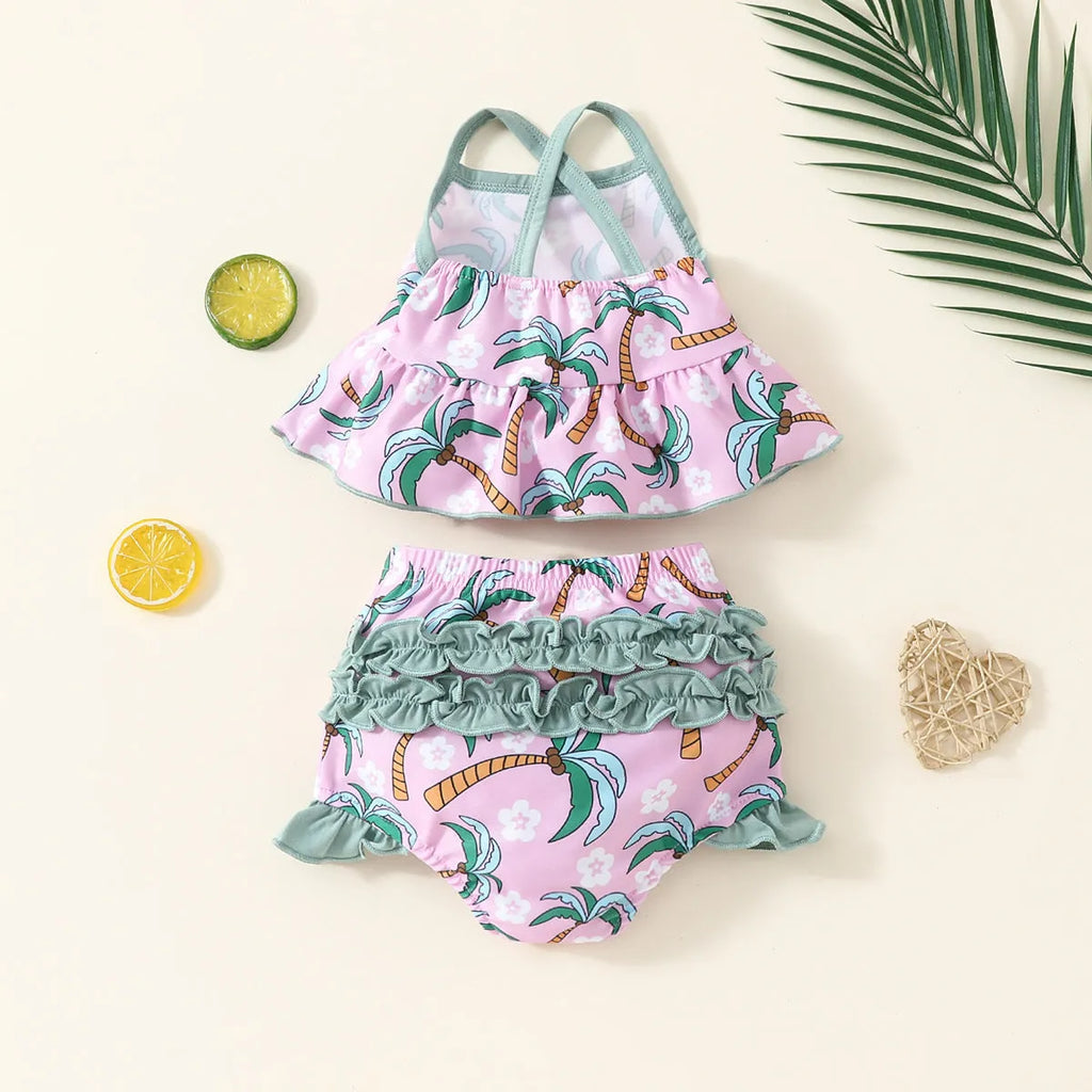 White sweet style children's two-piece swimsuit set with top and shorts on a hanger