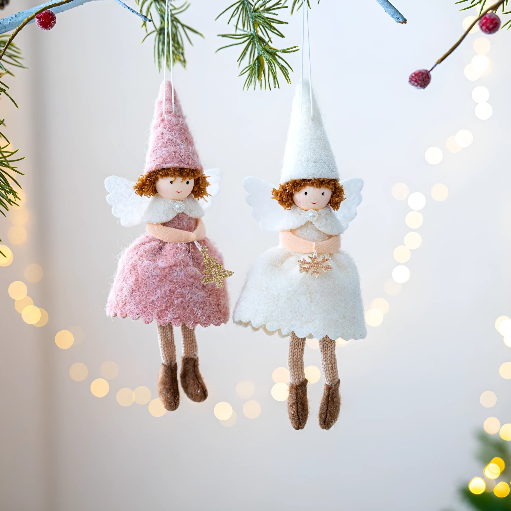 White cloth angel skirt Christmas pendant with plush texture on green tree branch