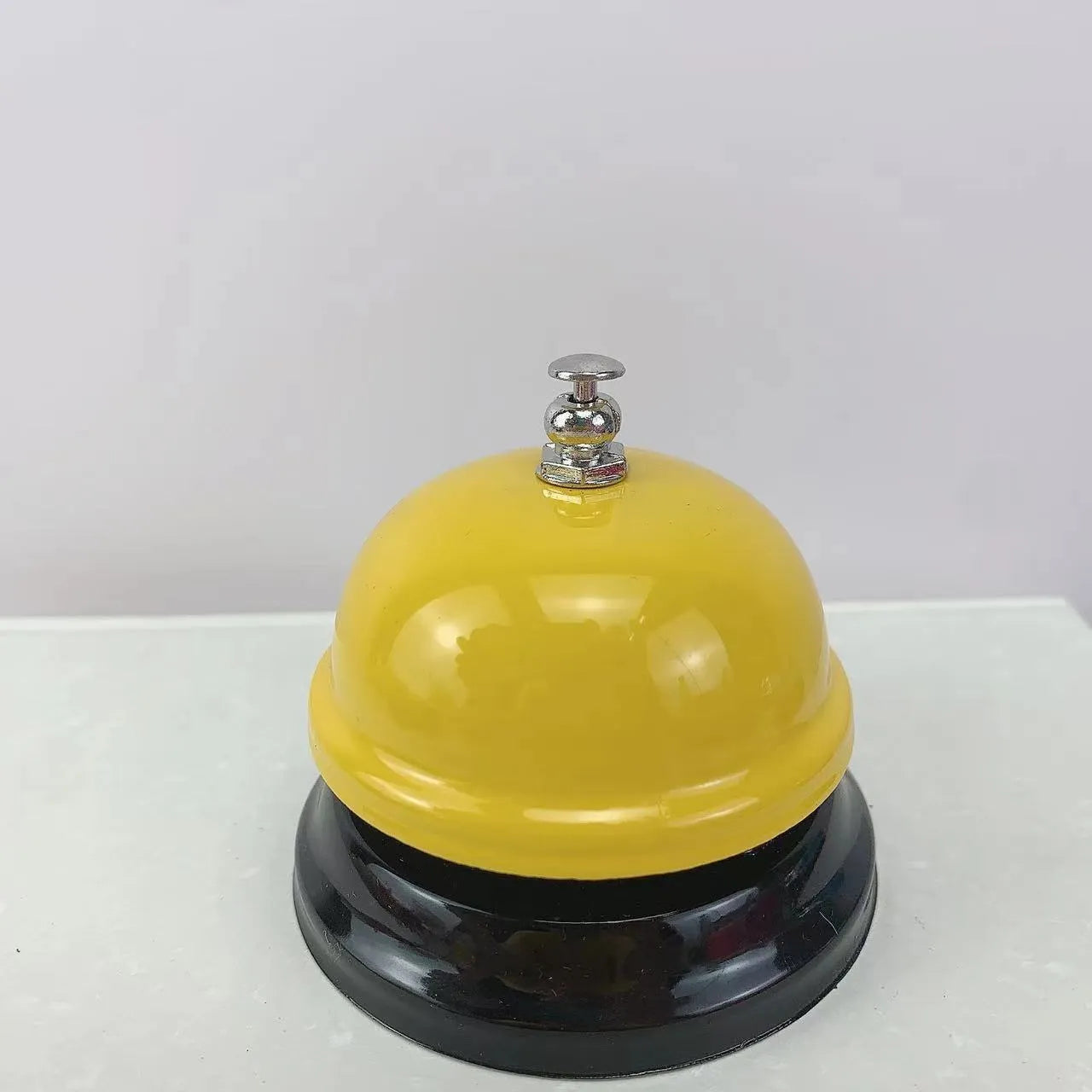 Iron class game bell in one of eleven colour options including red, green, blue, pink and yellow.
