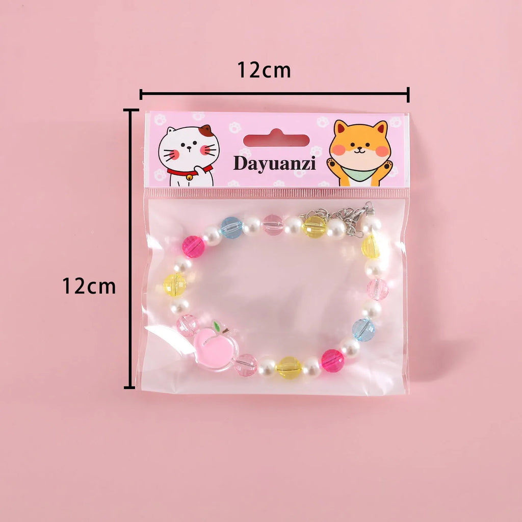 Colourful plastic pearl pet necklace for cats with small flower bead design and adjustable sizing