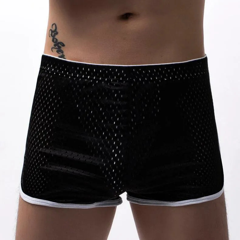 Men's three-point boxers in black, gray, and blue showing breathable knitted cotton nylon fabric and mid-waist fit.