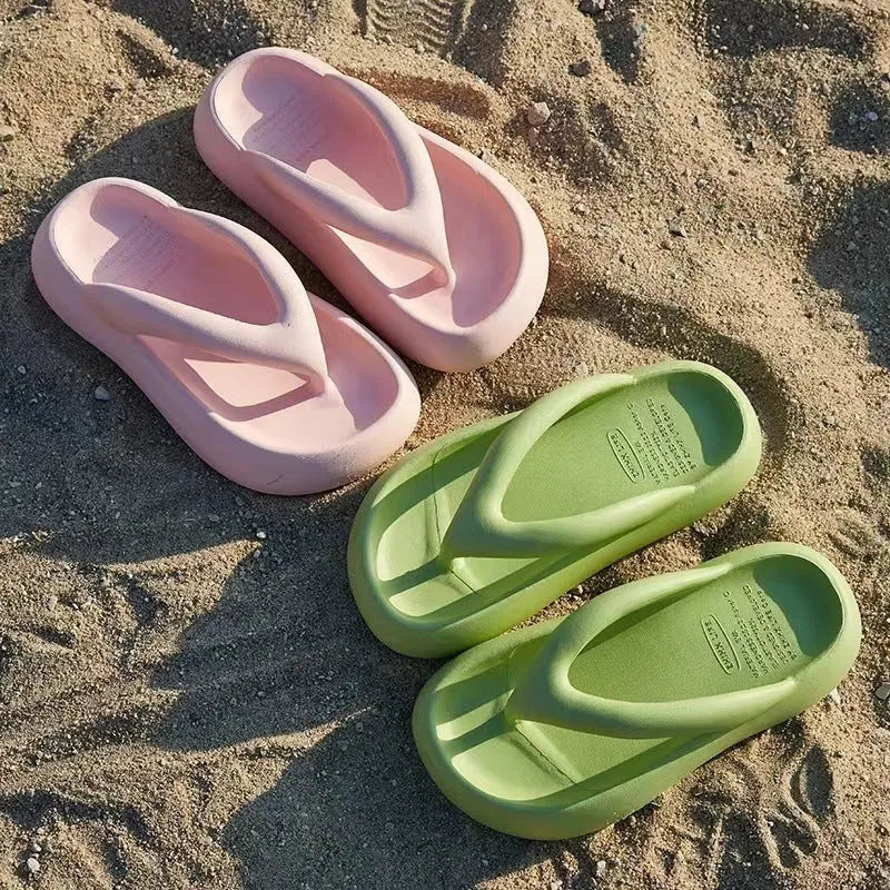 Solid colour thick-soled EVA flip-flops with a bow on the strap, shown on a white background.