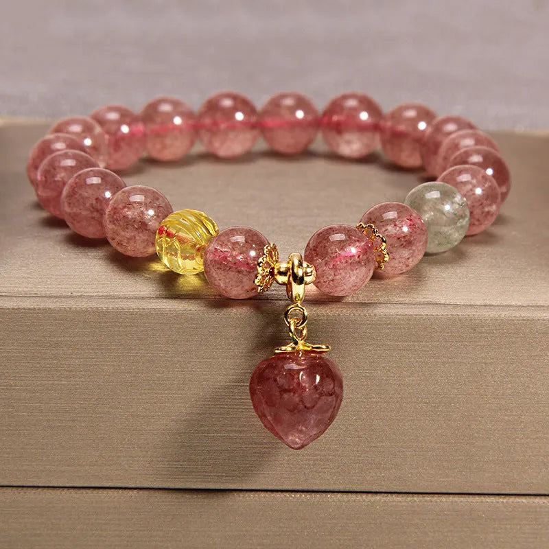 Women's multi-layer crystal bracelet with natural garnet, strawberry quartz, and moonstone pendants in Korean style.