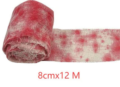 Roll of red Halloween horror gauze bandage with bloody dye effect, 8cm wide.