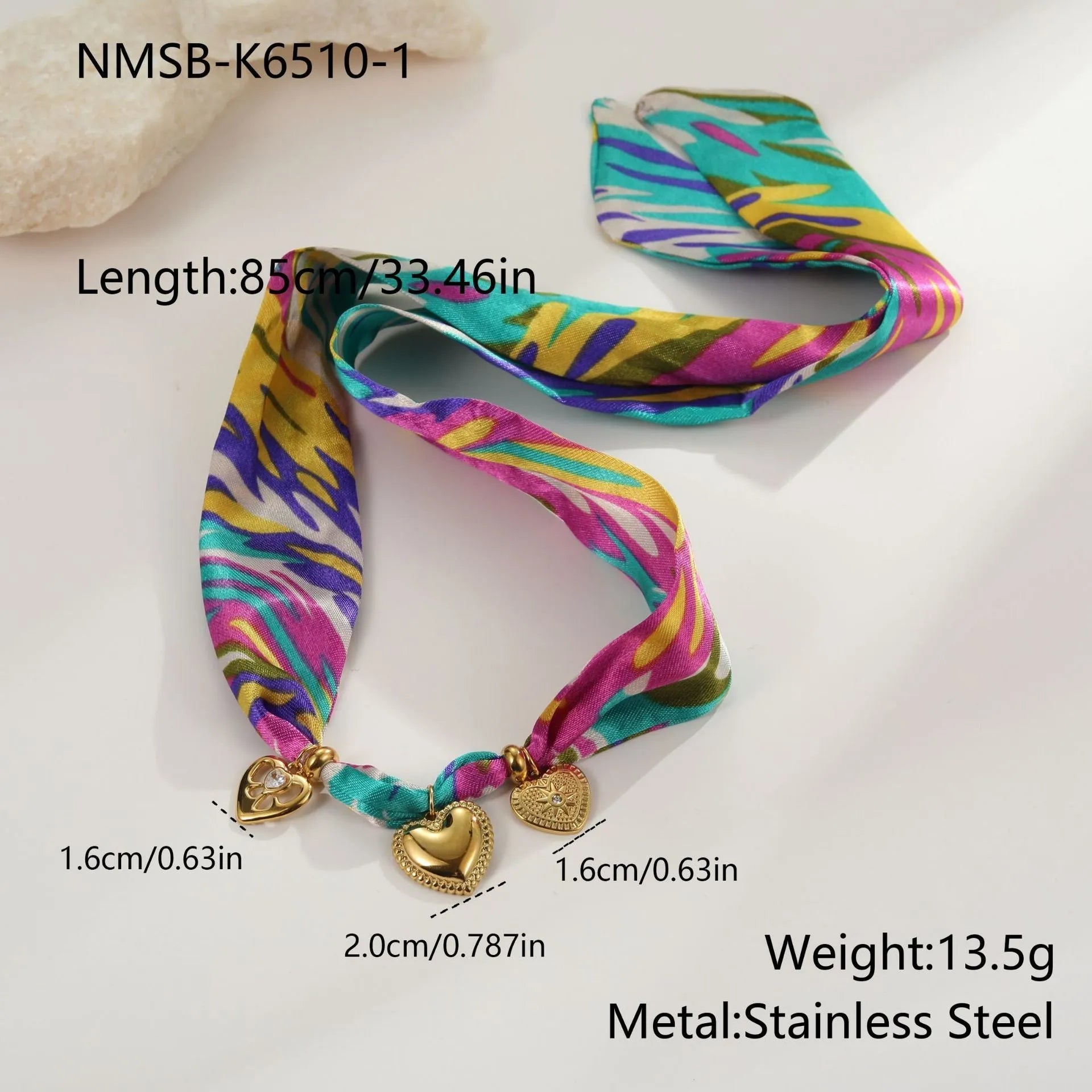 Women's stainless steel jewellery set with geometric pendant and gold plating