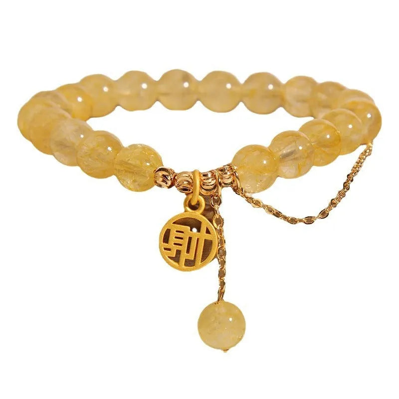Natural citrine bracelet with gold electroplated Chinese character charm on adjustable tassel