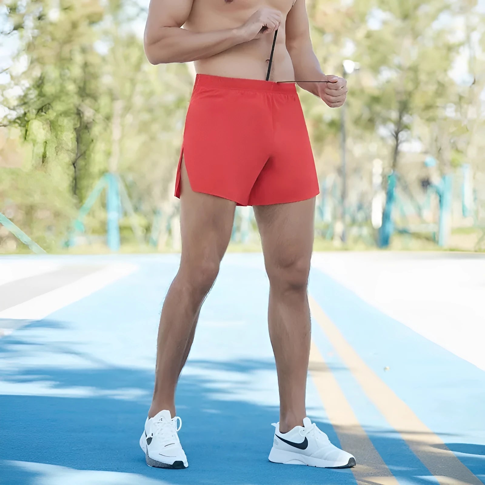 Men's red off-road running shorts with high-waist loose fit for trail running