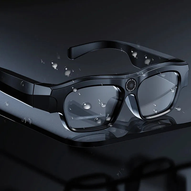 Black head-mounted smart Bluetooth glasses with transparent lens and camera for video recording