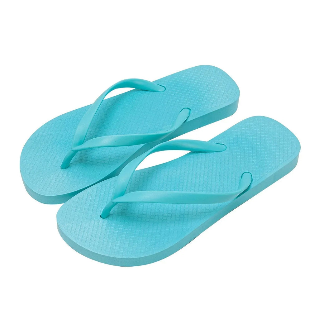 Foldable flat beach slipper with non-slip PVC sole and hollow-out plastic upper in orange colour.