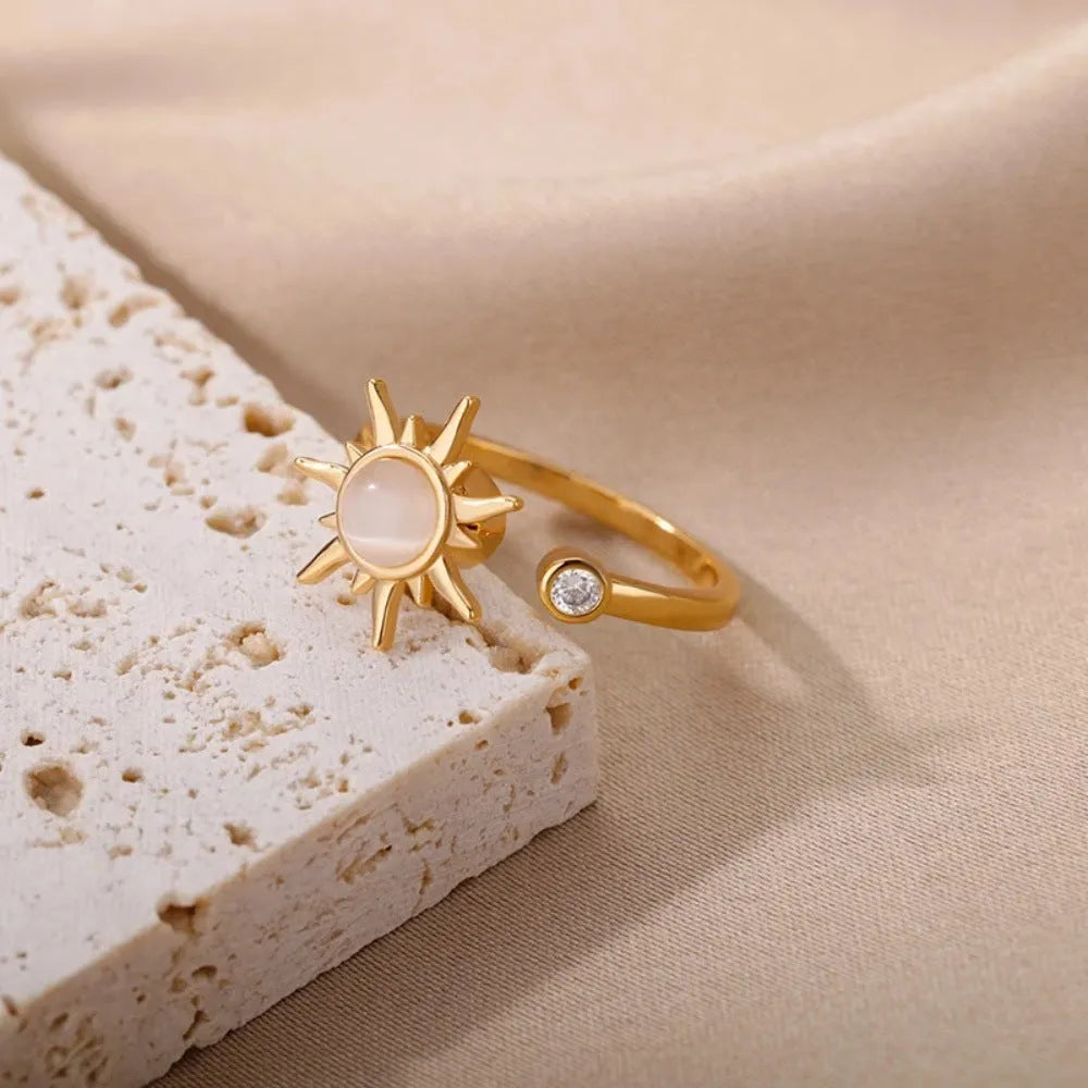 Copper rotatable decompression ring with adjustable opening in gold or platinum electroplated finish