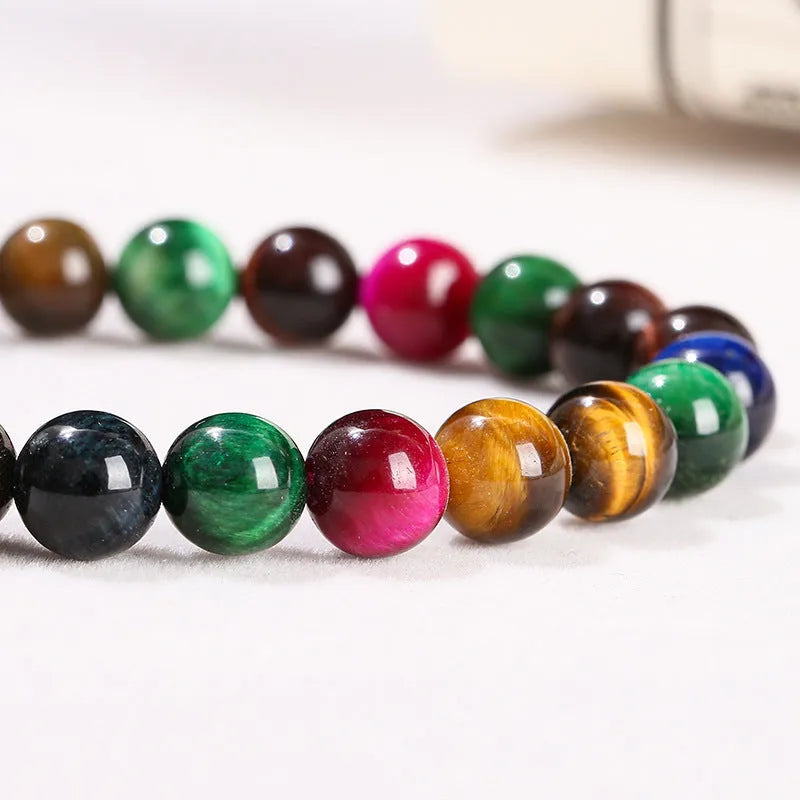 Colourful Tiger Eye women's bracelet with round beads in 6mm, 8mm, 10mm, and 12mm sizes on a mixed string.