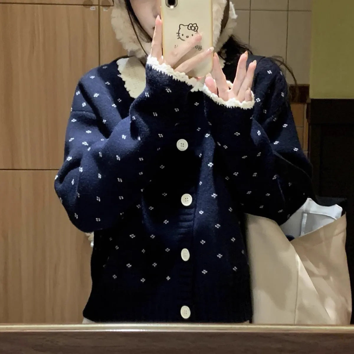 Floral pattern knitted cardigan coat with a Peter Pan collar in grey colour.