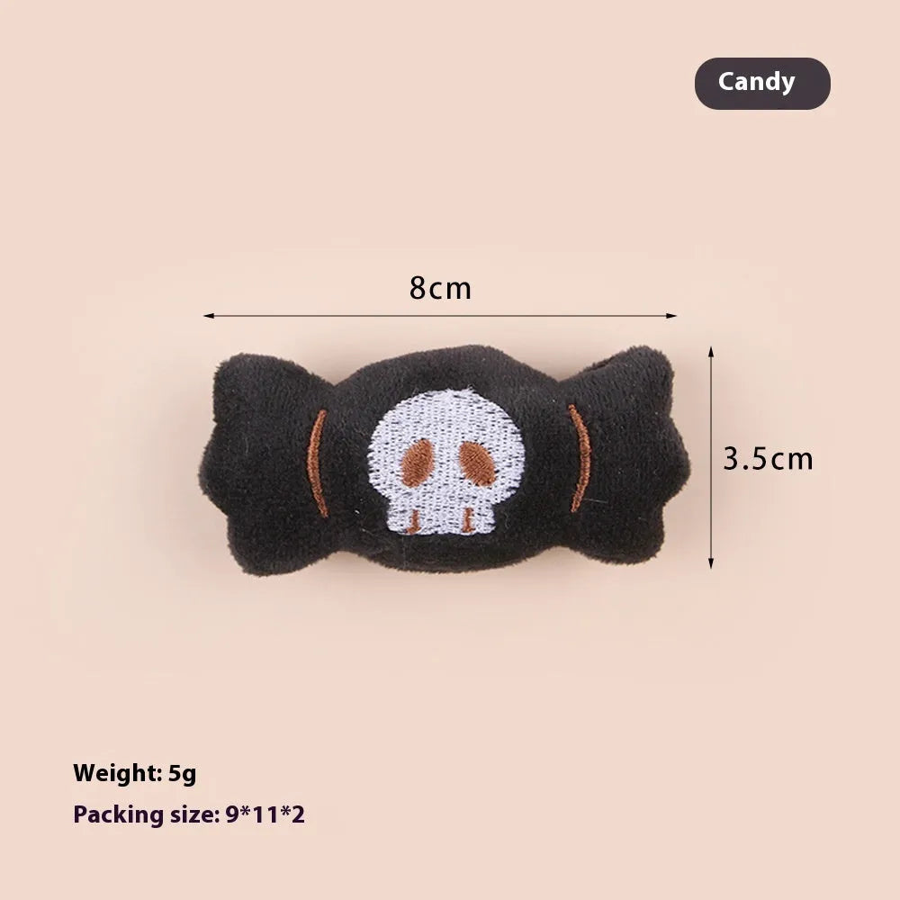 Small cat teaser wand with a soft plush head in eyes, candy, or skull design