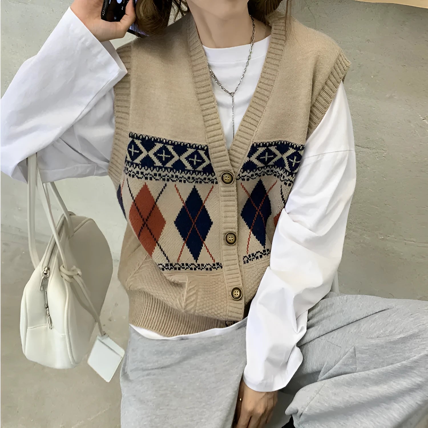 Diamond plaid pattern sleeveless cardigan top in loose fit free size