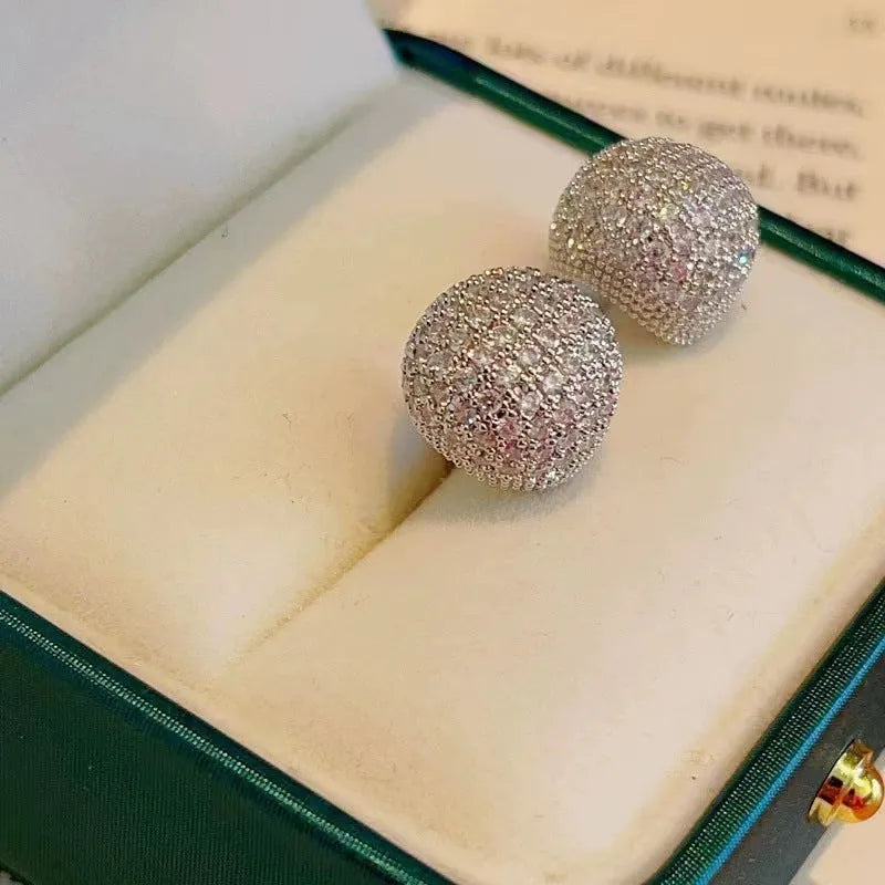 Geometric drop-shaped ear clip earrings with full diamond little golden beans detailing in gold and white finishes