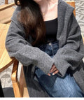 Long grey hooded knitted cardigan for women in loose Korean-style fit.
