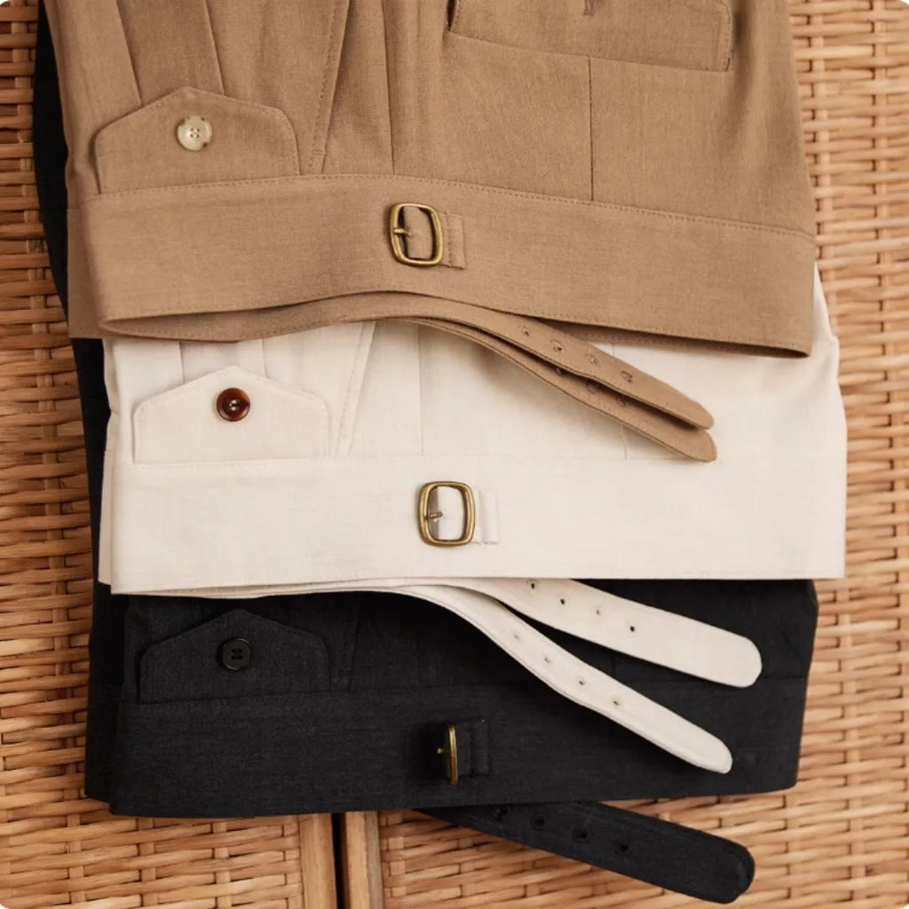 Men's slim fit straight leg business trousers in light brown colour, showing wrinkle resistant polyester fabric.
