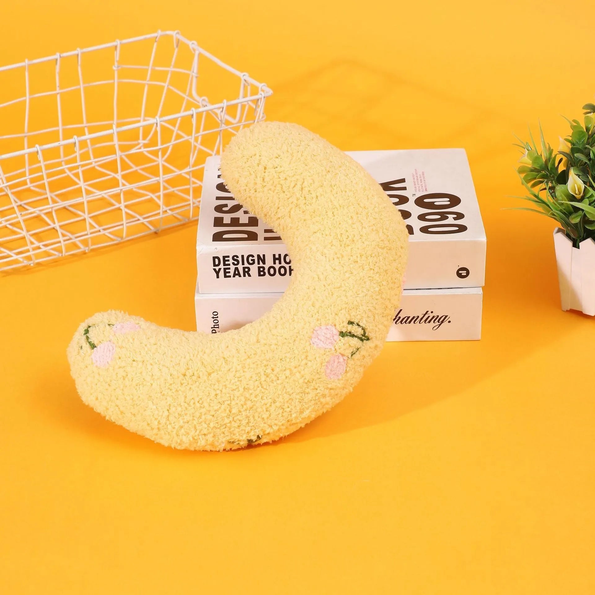 Cartoon half moon shaped U-shaped fabric pillow for cats in blue, pink, white, and yellow colour options