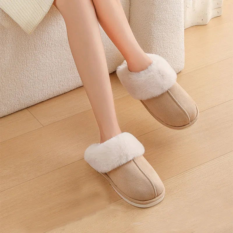 Women's brown plush indoor slippers with artificial wool lining and a textured PVC sole.
