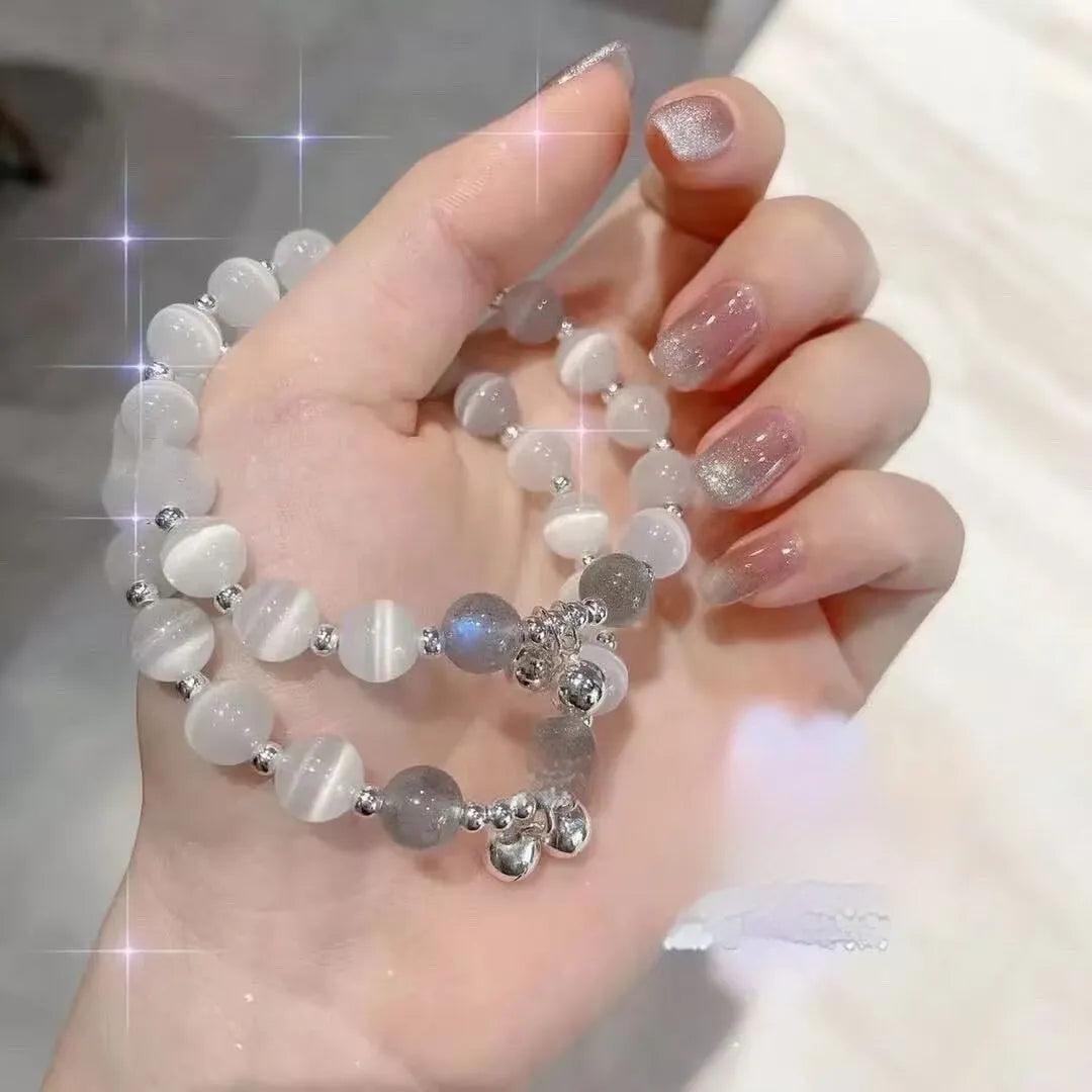 Handcrafted glass butterfly bracelet with drop-shaped moonlight grey beads and special-interest design