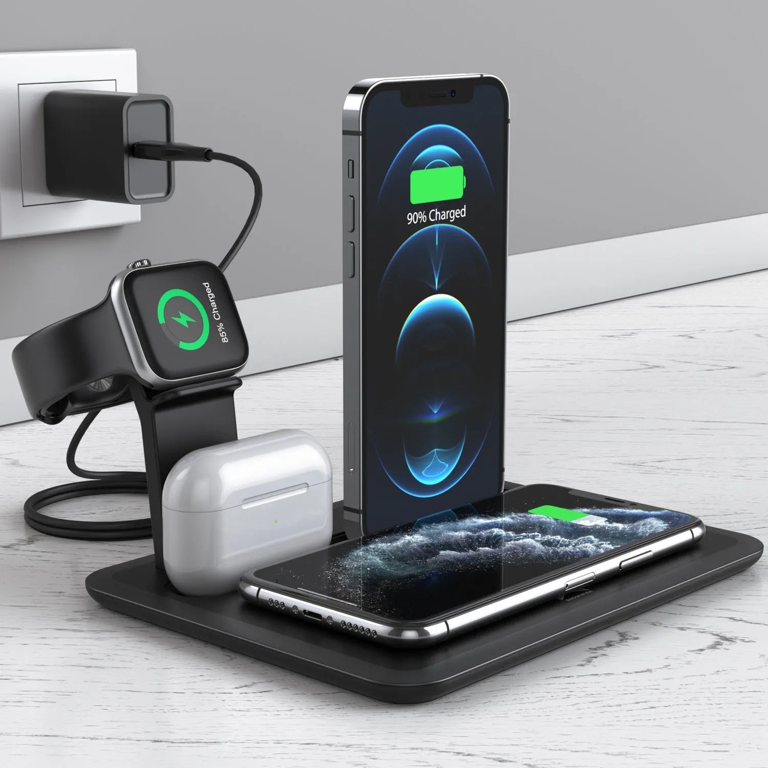 Black and white desktop charging station for wireless phone, watch, and headphone charging with USB cable.