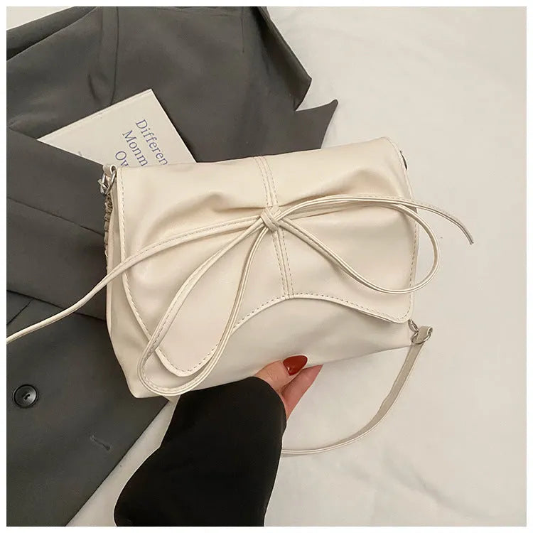 Women's black PU leather crossbody underarm bag with horizontal square shape and sewing line detail