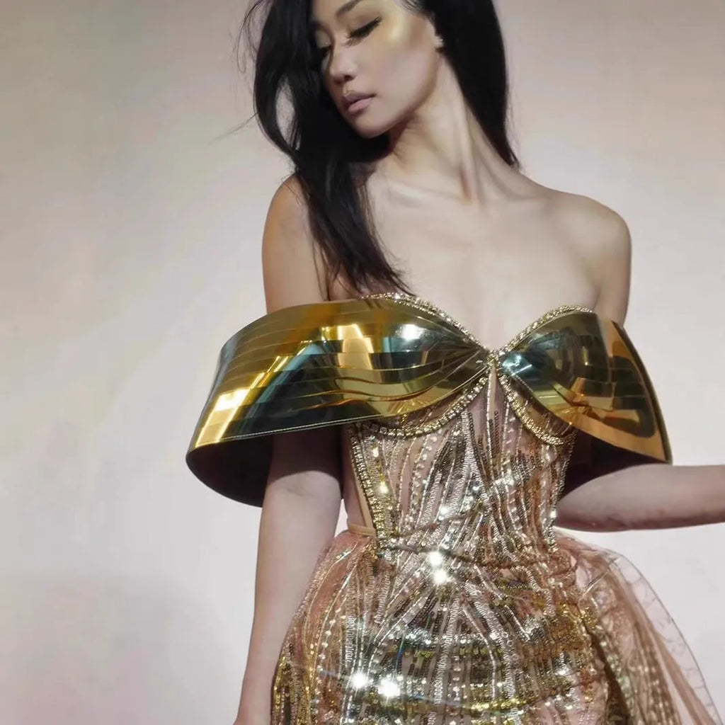 Gold strapless sequin evening dress with side split long skirt and tulle detail