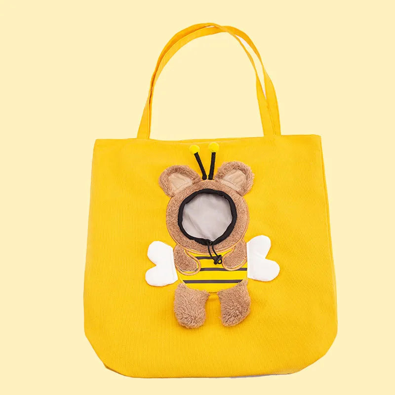 Little Bee Design canvas pet carrier shoulder bag with safety zippers and an adjustable elastic head opening for a cat or small dog.