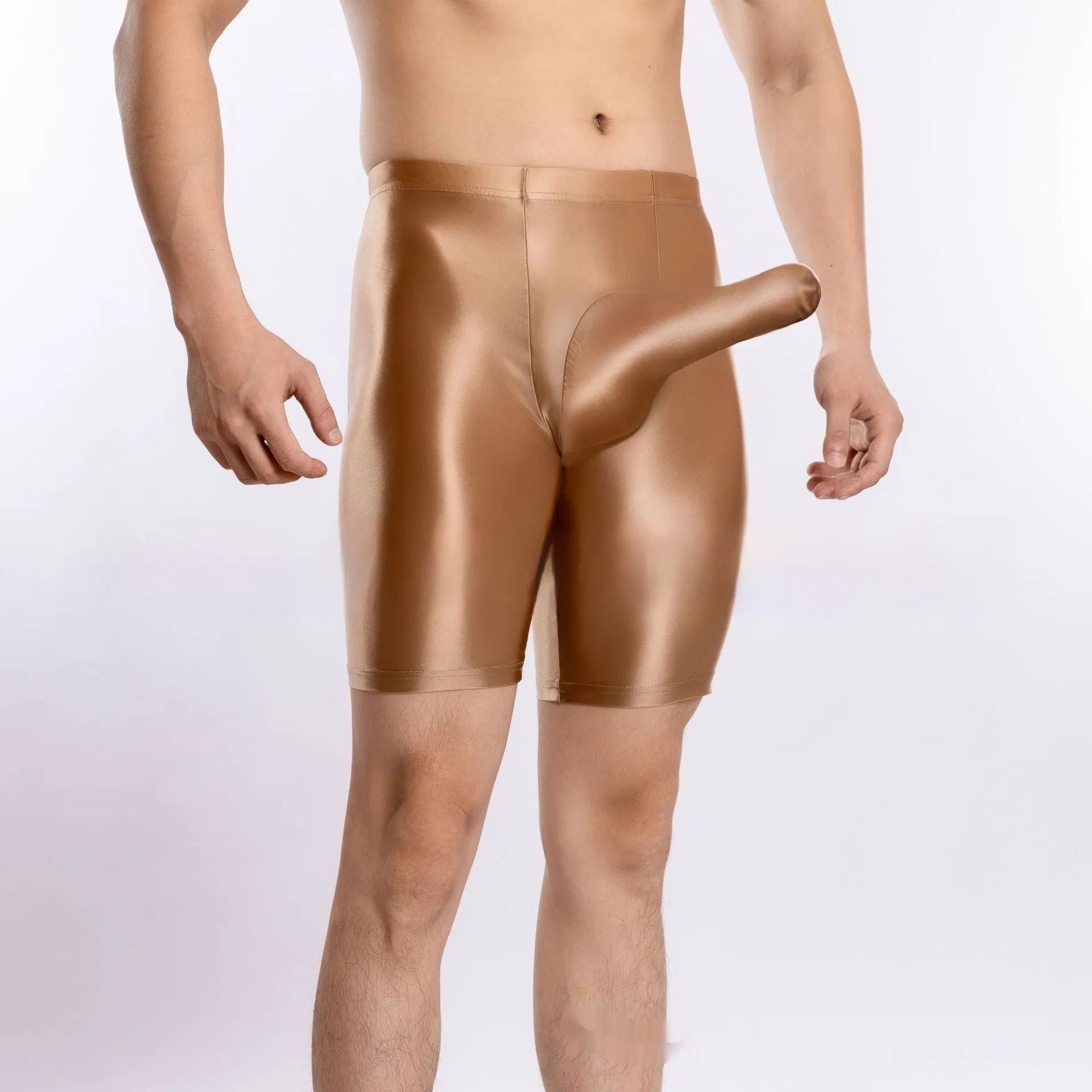 Man wearing shiny black plus size nylon sports shorts, showing silky finish.