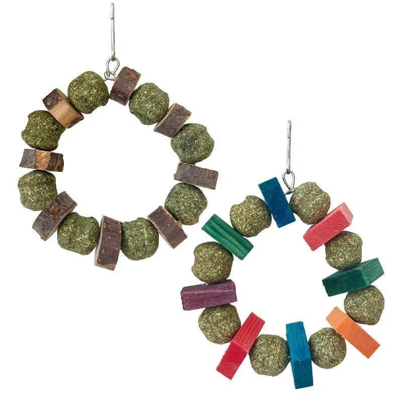 Decorative straw ball ring chew toy made from applewood for hamsters and small pets.