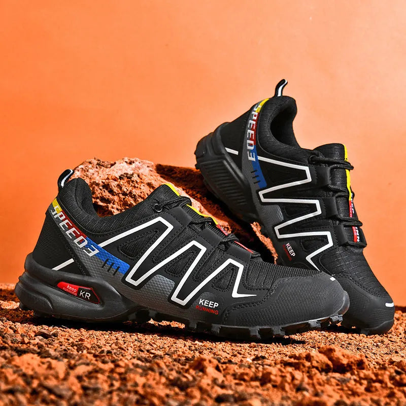 Men's gray orange casual low-top running shoes with synthetic leather upper and rubber sole.