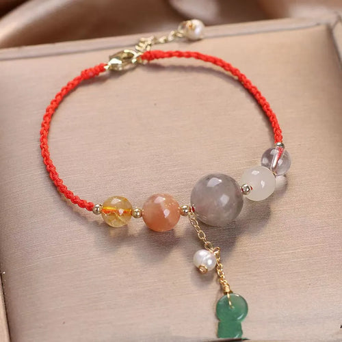 Hand-woven crystal bracelet with sequin details and adjustable buckle in three colour options
