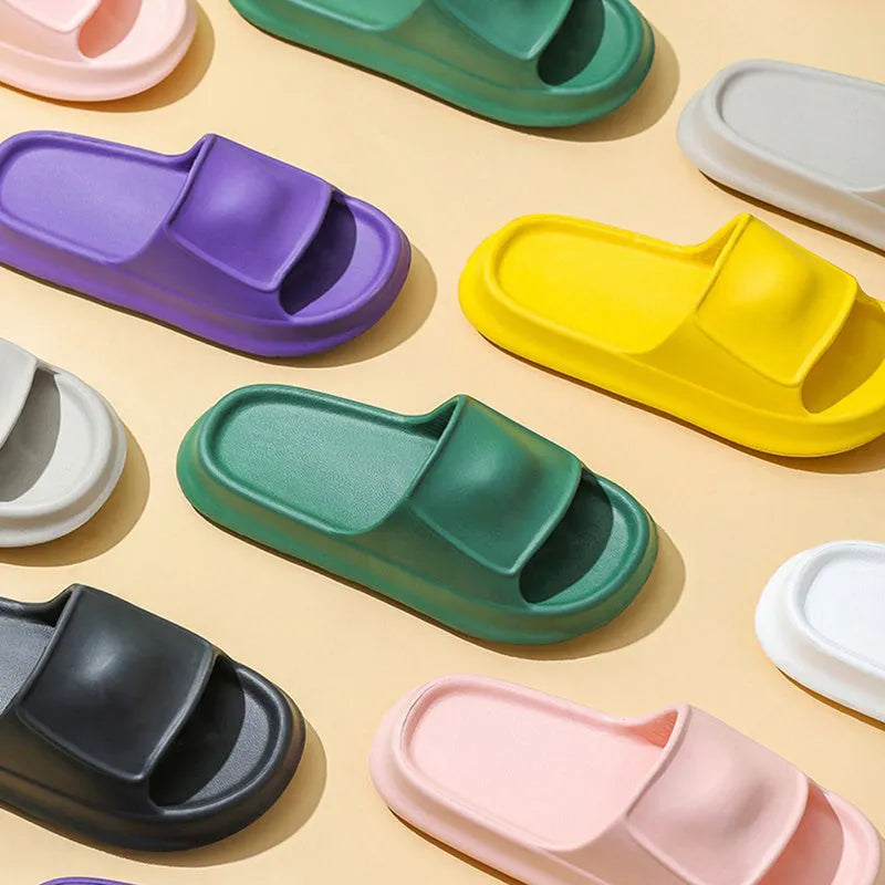 Soft EVA flip-flop slippers with thick non-slip sole in multiple colours on a white background.