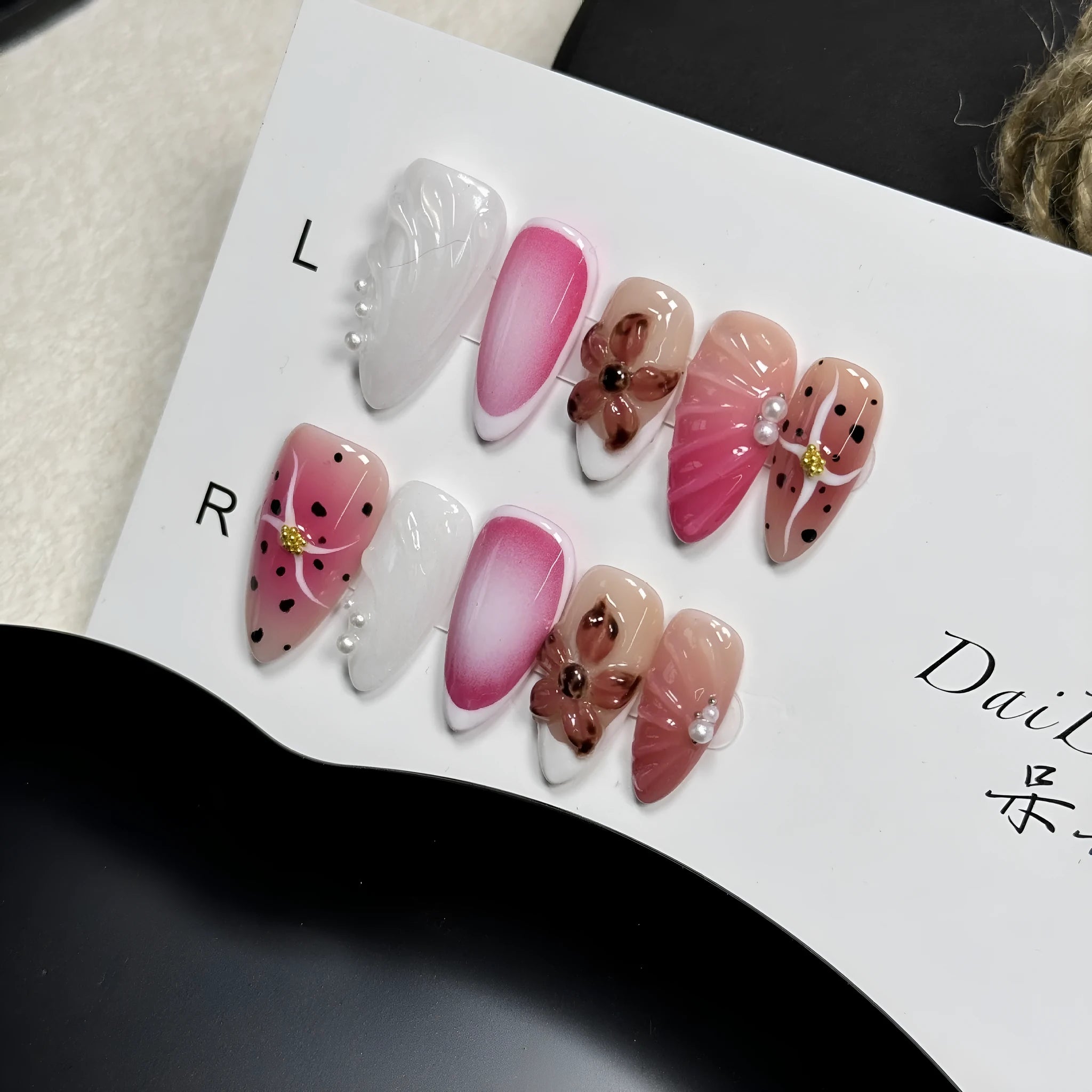 Hand-painted 3D carved nail patches showing embossed candy patterns in colourful designs.