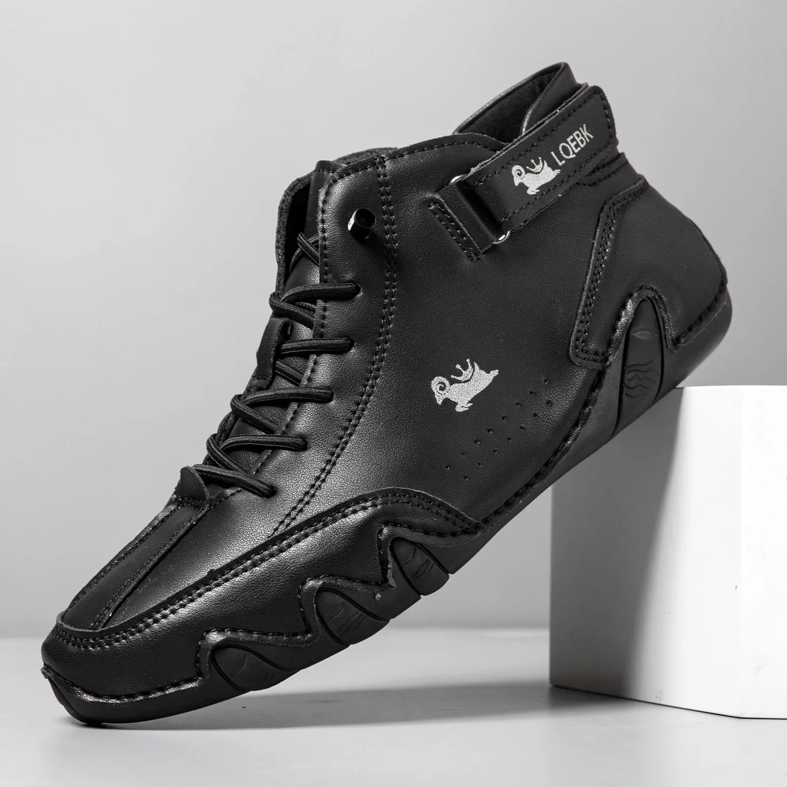 Men's brown high-top Octopus design Martin boots with a round toe and flat rubber sole.