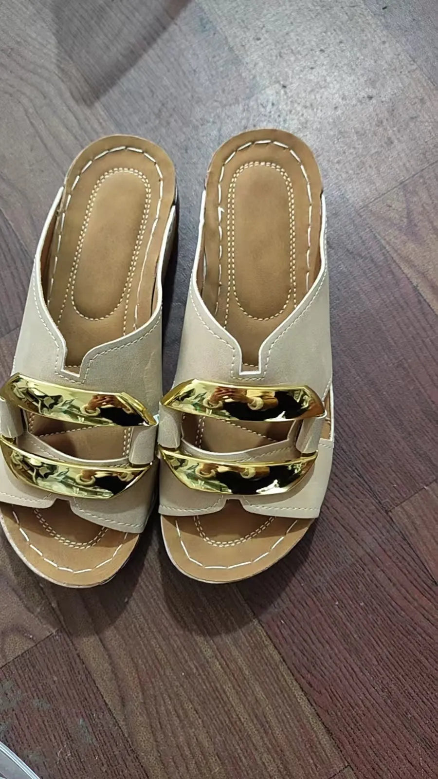 Roman style platform sandals in white, black, khaki, and sea blue on a solid background