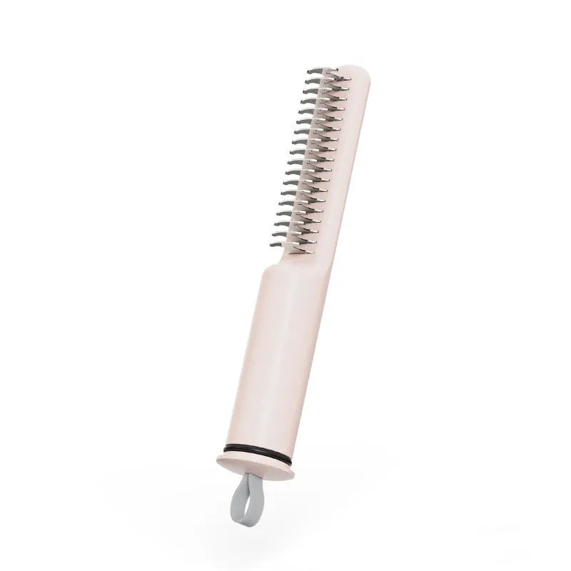 Stainless steel dog dematting comb with ergonomic handle on a white background