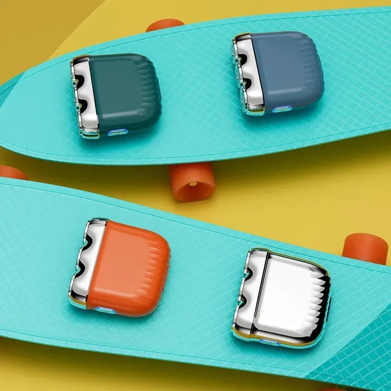Three-head magnetic electric shaver in gun metal, orange, green or blue colours with floating cutter adjustment