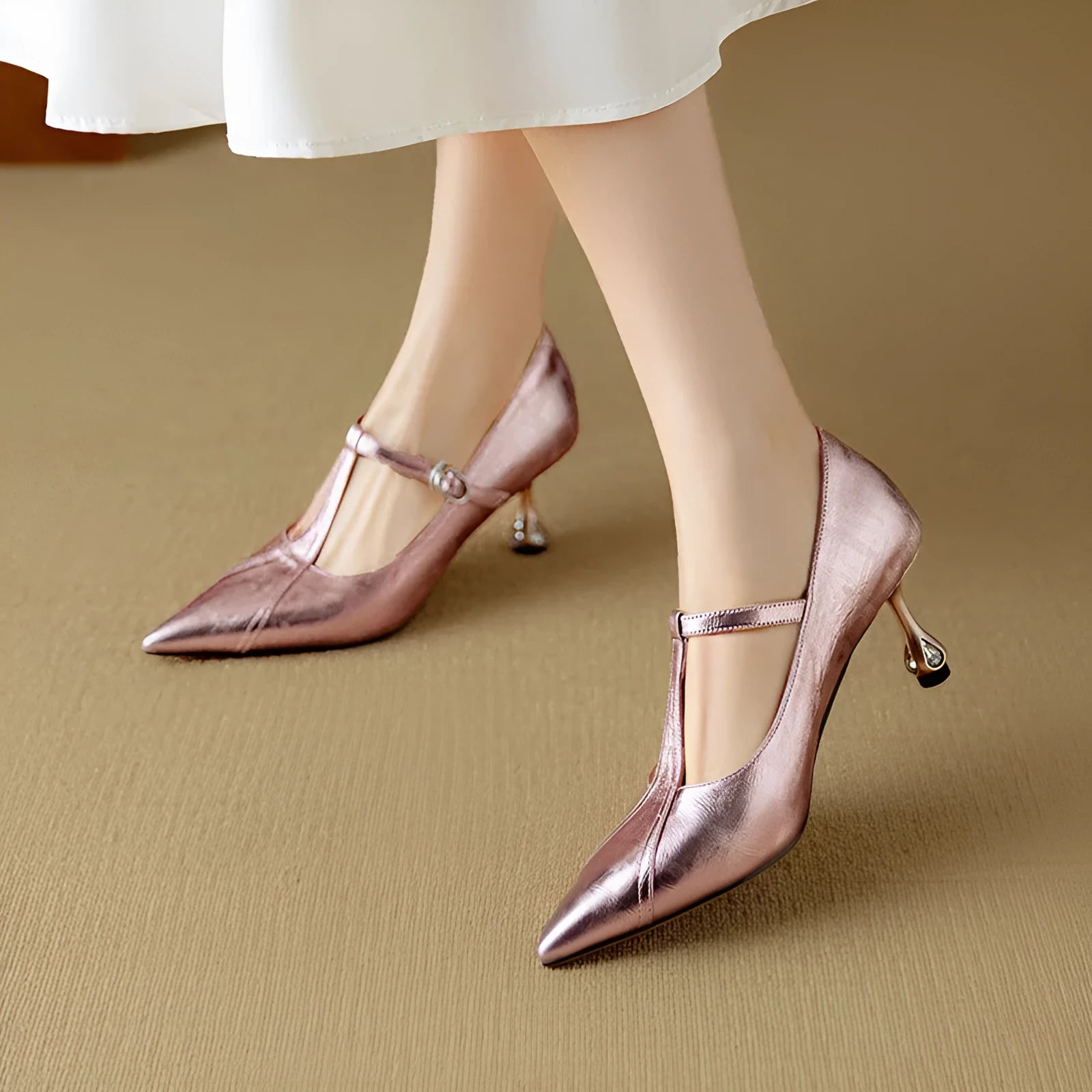 Women's gun colour leather pumps with a chunky mid heel and round pointed toe.