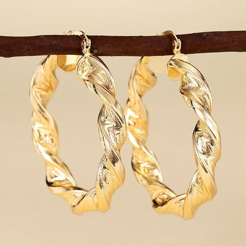 Copper geometric ring design ear clip earrings for women in assorted colours.